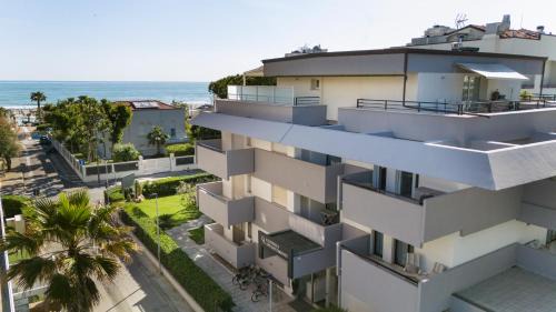 Riccione Apartment | Oceanfront Carinzia Appartamenti with Private Beach Access