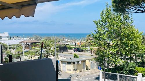 Riccione Apartment | Oceanfront Carinzia Appartamenti with Private Beach Access