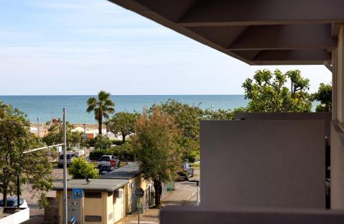 Riccione Apartment | Oceanfront Carinzia Appartamenti with Private Beach Access