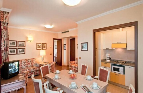 Baveno Apartment | Lake View Comfort at Carl&Do Apt with Spa & Pool Access