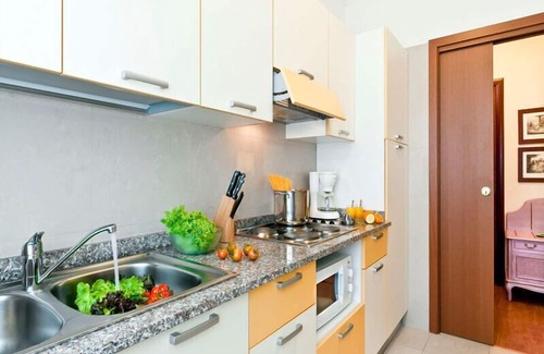 Baveno Apartment | Lake View Comfort at Carl&Do Apt with Spa & Pool Access