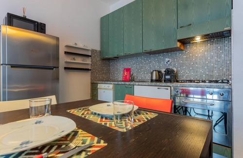 Borgo Dora Apartment | Discover Sui Tetti di Torino with Child-Friendly Amenities