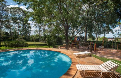 Limeira Hotel | Stay at Carlton Suítes Limeira with Pool and Hot Tub