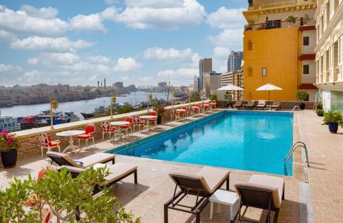 Al Rigga Hotel | Relaxing Oasis at Carlton Tower Hotel with Oceanfront Views