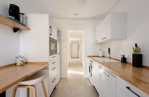Genil Apartment | Discover Comfort at Carmela Suites - Family Friendly Stay