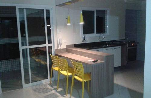 Praia Grande Condo | Sea View Haven: Enjoy a Balcony with Barbecue & Spa