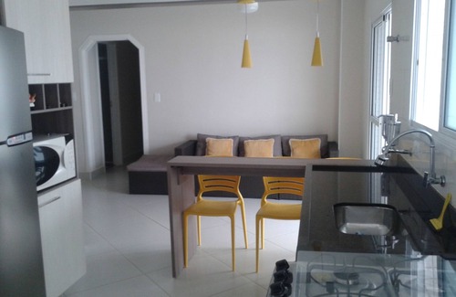 Praia Grande Condo | Sea View Haven: Enjoy a Balcony with Barbecue & Spa