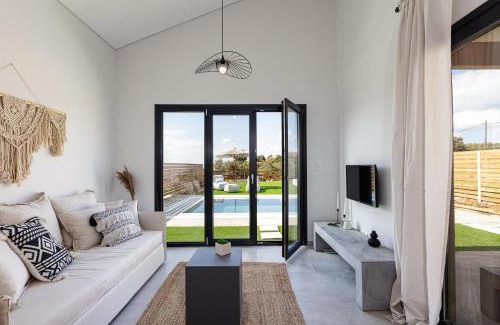 Kounelion Villa | Eco-Friendly Carob Villas: Oceanview Retreat for Families