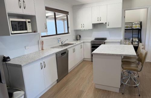Carribie House | Cozy Carron Cottage - Family and Pet Friendly Retreat
