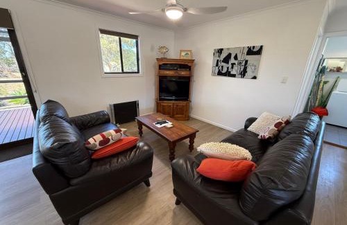 Carribie House | Cozy Carron Cottage - Family and Pet Friendly Retreat