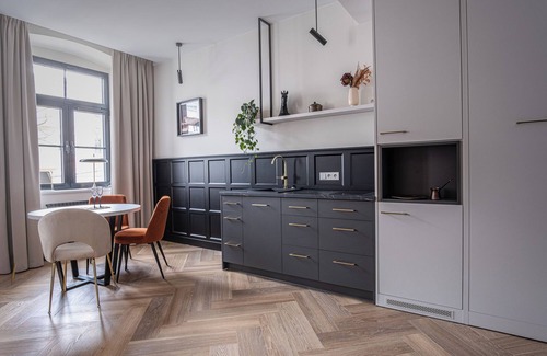 Czestochowa Apartment | Family-Friendly Carvala Boutique Apartments with Kitchenette