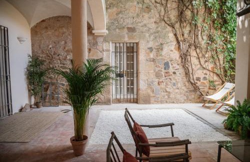 Caceres Old Town Apartment | Discover Casa Águila: Historic Charm with a Private Patio