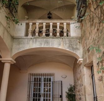 Caceres Old Town Apartment | Discover Casa Águila: Historic Charm with a Private Patio
