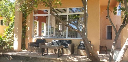 Palamos Villa | Unique Casa with Garden, Steps from the Beach and Ocean Views