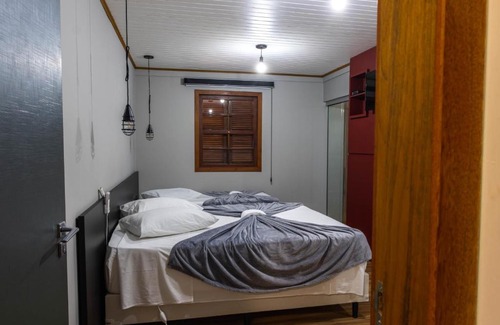 Biguacu House | Relax at Casa 3 Suítes with Pool and BBQ Amenities
