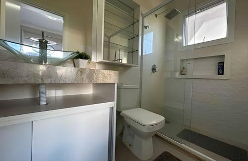 Capao da Canoa House | Exquisite Casa 4 Suítes: Poolside Retreat at Lago-Ilhas Resort