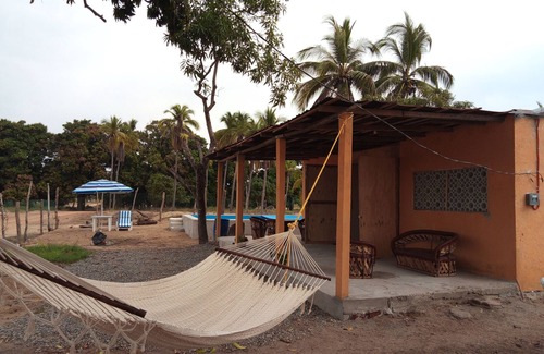 Coacoyul House | Casa A Steps from Zihuatanejo Beach - Pet Friendly Retreat