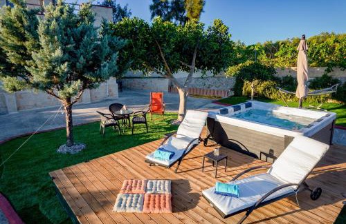 Alonia Villa | Inviting Adam Stone Villa with Ocean Views and Hot Tub