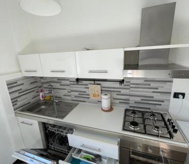 San Teodoro Apartment | Casa Alizeri: Convenient Stay with Free Parking Nearby