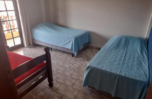 Sao Lourenco Apartment | Discover Casa Amanda Guimarães: Family & Pet Friendly Retreat