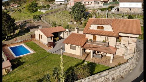 Cerponzons House | Experience Casa Ameán: Oceanfront Getaway with Pool & Pets