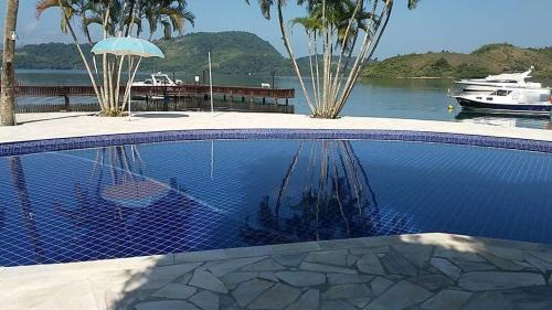 Itanema House | Relax at Casa Angra Itanema: 4-Star Oceanfront Escape