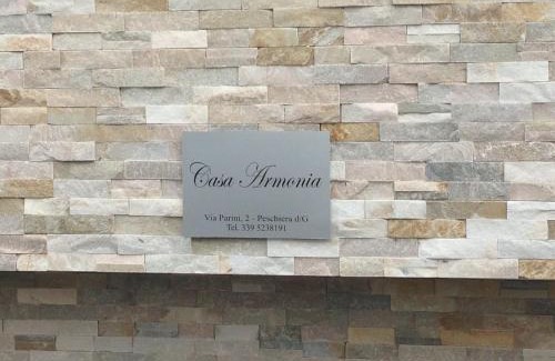 San Benedetto di Lugana Apartment | Relax at Casa Armonia: Oceanfront Views & Hot Tub Awaits