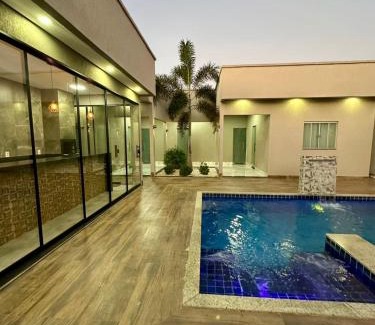 Aruana House | Discover CASA ARUANÃ: 5 Suites with Pool & Pet Friendly