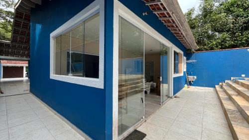 Quinta do Guarau House | Pet-Friendly Casa Azul with Oceanfront Pool Views
