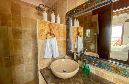 Puerto Villamil Hotel | Discover Casa Baronesa: Ocean Views & Spa Amenities