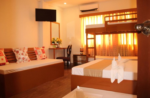 Puerto Princesa City Centre Bed & Breakfast | Discover Casa Belina Tourist Inn: Guest Rated 9.8/10