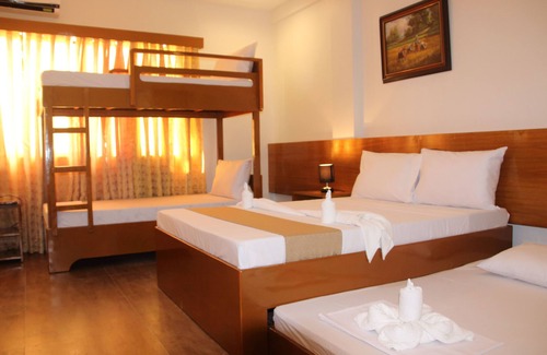 Puerto Princesa City Centre Bed & Breakfast | Discover Casa Belina Tourist Inn: Guest Rated 9.8/10