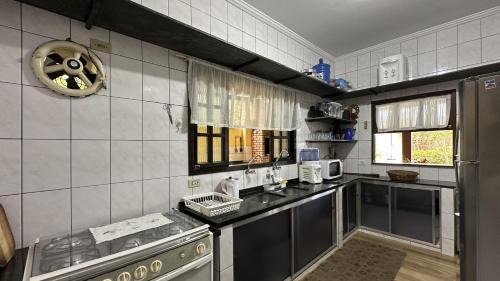Jardim Capricornio House | Family-Friendly Casa with Pool, Steps from Caraguatatuba Beach