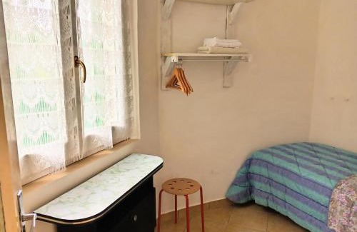 Mombaroccio House | Discover Casa Cairo: Family-Friendly Rooms with Great Amenities
