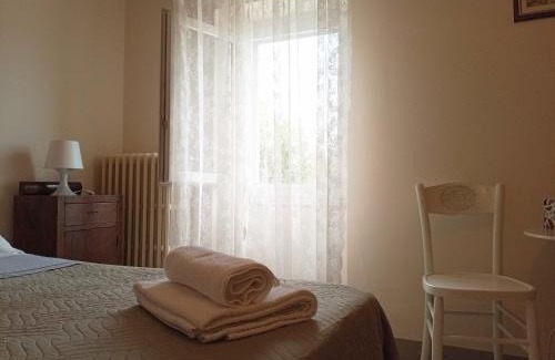 Mombaroccio House | Discover Casa Cairo: Family-Friendly Rooms with Great Amenities