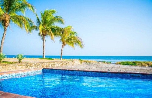 Playa Colorado House | Casa Cantamar: Inviting Oceanfront Retreat with Spa Access