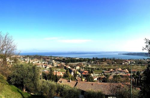 Padenghe sul Garda Apartment | Explore CASA CASTELLO: 4-Star Gem with Hot Tub & Pets Welcome