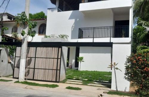 Bacocho House | Cozy Beachside Home with Pool and Hot Tub Amenities