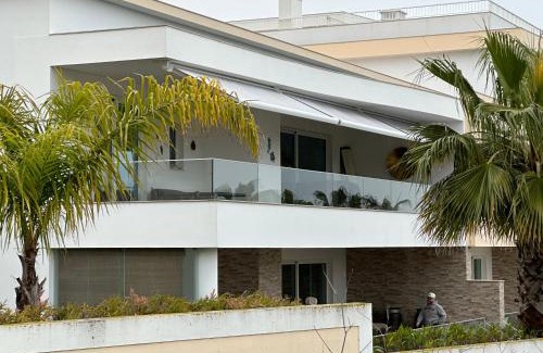 Porto de Mos Apartment | Oceanfront Casa Chloe: A 4-Star Getaway with Pool Access