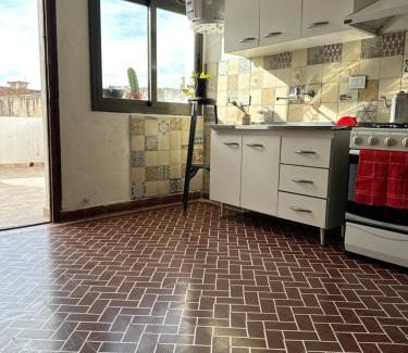 Dean Funes Apartment | Budget-Friendly Casa Ciao: Pet Friendly & Family Amenities