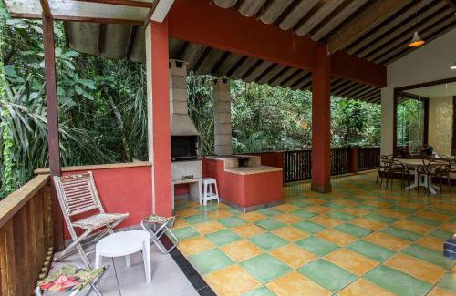 Cidade Jardim Tom House | Elegant Casa with Ocean View at Praia de Iporanga, Guarujá