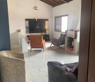Tramandai House | Inviting Casa with 4 Bedrooms and Pool for Your Getaway