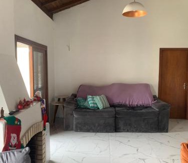 Tramandai House | Inviting Casa with 4 Bedrooms and Pool for Your Getaway