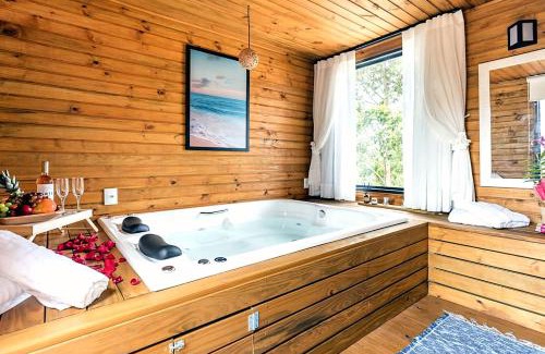 Praia do Rosa Villa | Relaxing Casa with Pool, Hot Tub, and Ocean Views