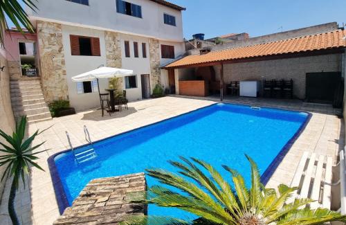 Pauliceia House | Relaxing Getaway at Casa com Piscina e Laser
