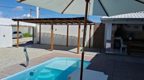 Prado House | Relax at Casa com Piscina: 4-Star Retreat by the Beach