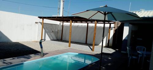 Prado House | Relax at Casa com Piscina: 4-Star Retreat by the Beach