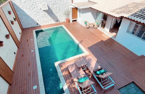 Santinho House | Idyllic Oceanfront Retreat with Pool by Praia do Santinho