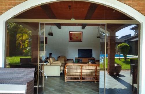 Pereque House | Idyllic Casa with Pool in Exclusive Guarujá Community