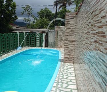 Mongagua House | Inviting Retreat with Pool in Mongaguá for Family Fun
